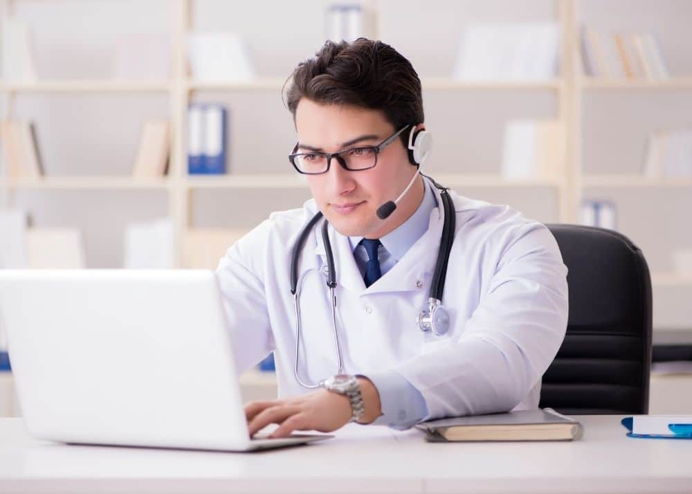 Telemedicine - eye doctor discussing patient care